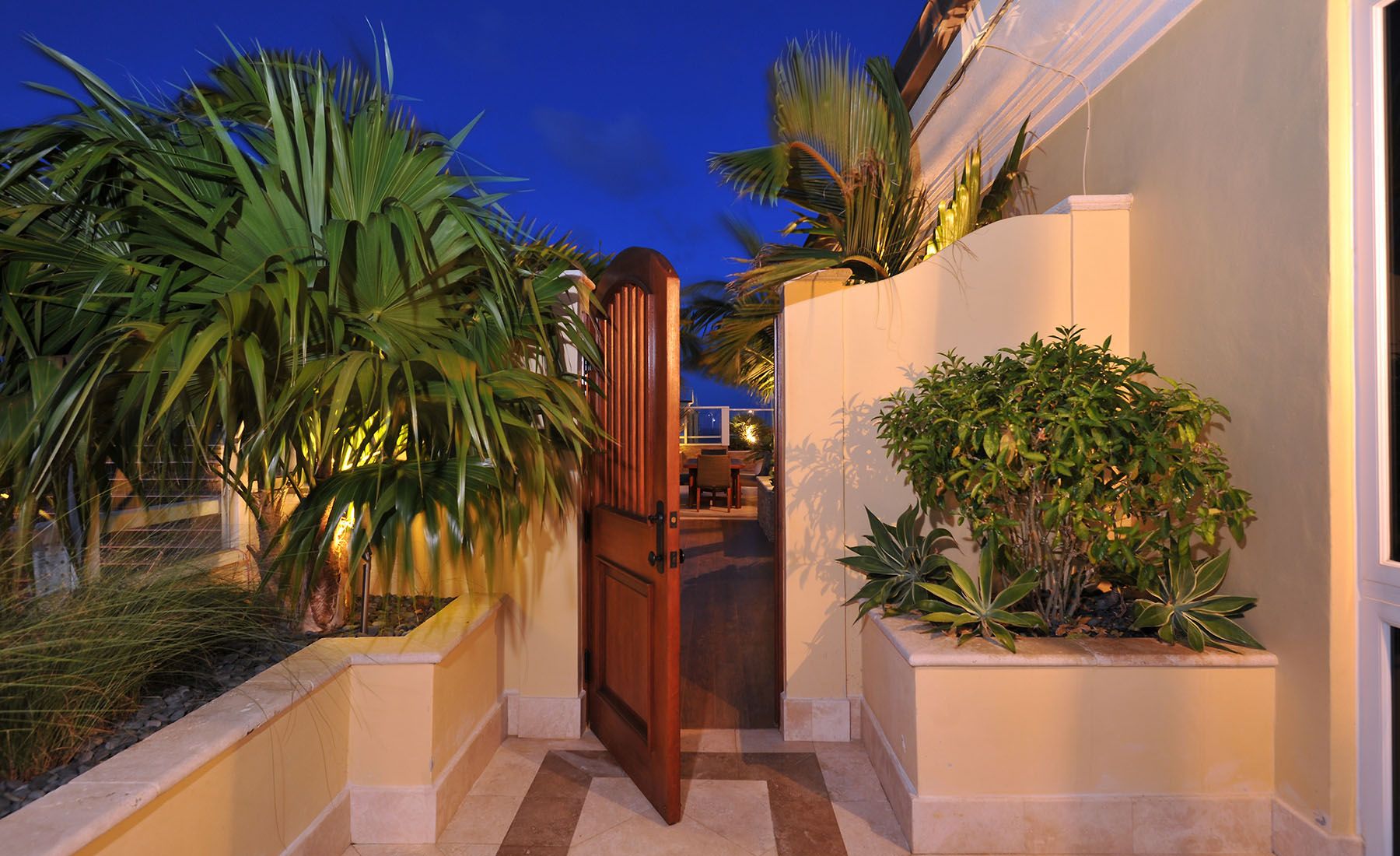 Experience the enchanting night view of the inviting entrance