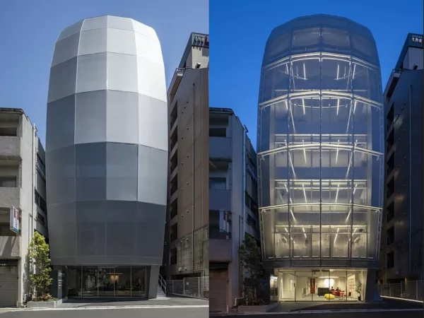 Architecture firms in Japan - BUILDING OF MUSIC, showcasing its dynamic design in daylight and illuminated beauty at night.