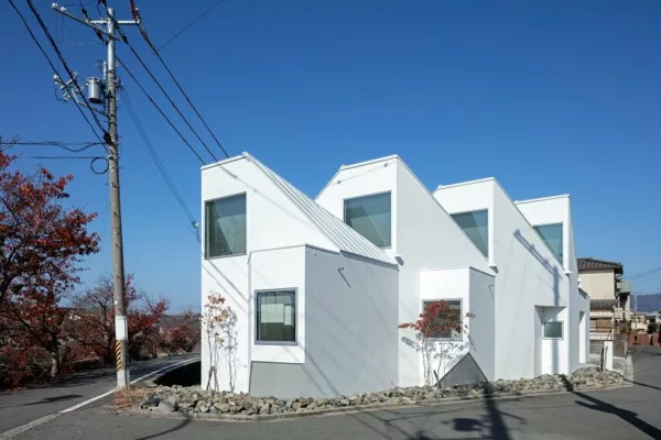 Street view of HOUSE IN OTA, exemplifying award-winning Japanese architecture companies.