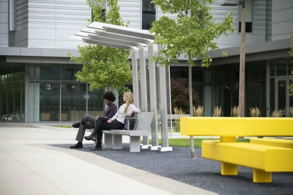 Theory outdoor furniture collection, blending art and utility in public spaces.
