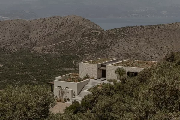 Aerial view of the O Lofos project, illustrating its integration into the natural landscape.