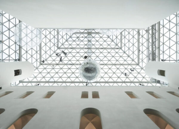 Looking upward from the K21 floor toward the suspended In Orbit installation.