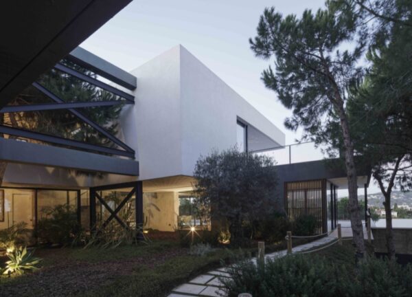 Close exterior view of Villa Grazalema from the landscaped garden patio area.