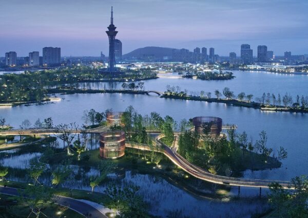 Nighttime view of Qin Lake Park illuminated with soft lighting, award-winning landscape design by Grasp Earth Architecture & Landscape Design Co., Ltd.
