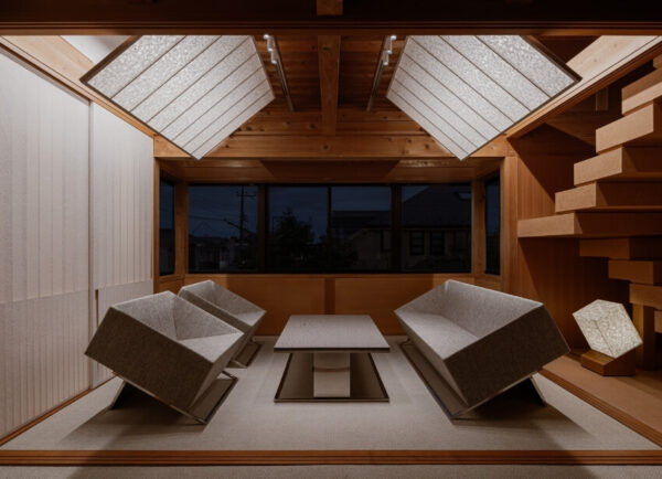 Interior of Symbolplus Office in Tokyo by SYMBOLPLUS INC., featuring exposed timber structure, washi ceiling panels and traditional Japanese carpentry, winner of the AMP Interior Design of the Year Award 2025