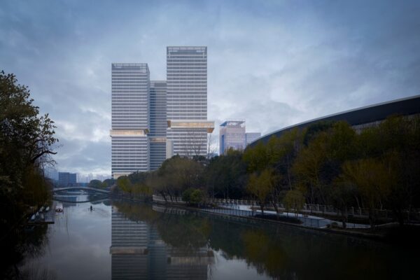 Public plaza with pedestrian activity and green landscaping