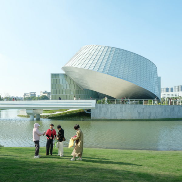 Reflection of the museum on Yohoo Lake emphasizing its floating presence.