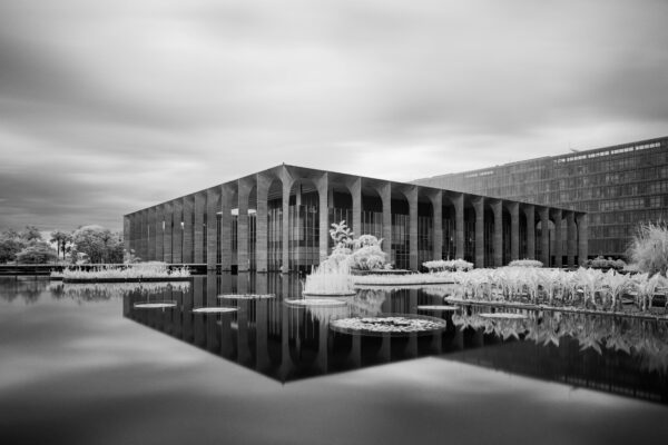 Minimalist black-and-white photograph of modernist architecture in Brasília captured using infrared photography.