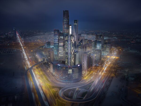 King Abdullah Financial District buildings illuminated at night in Riyadh, photographed by Shoayb Khattab